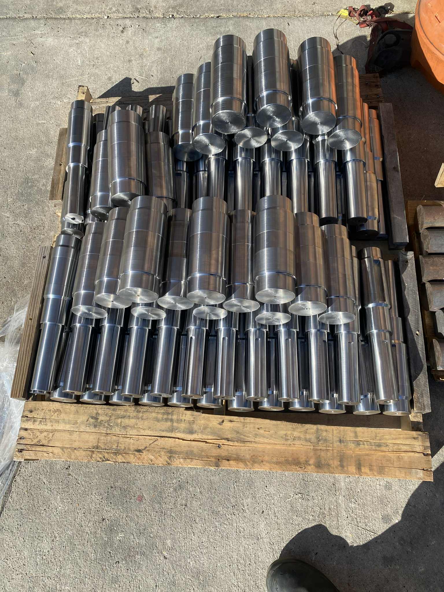 Stacked machined aluminum parts made by BetaManufacturing